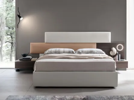 Letto con testiera sfalsata in ecopelle con comodino e luce integrati Bumpy di Maronese Acf