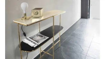Mobile ingresso in ottone lucido con piano superiore in ceramica e piano inferiore in legno Puro Calligaris