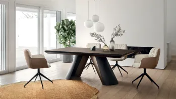 Sedia Cocoon con base girevole in tessuto e pelle di Calligaris