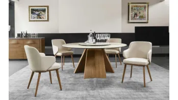 Tavolo rotondo con piano in ceramica e basamento in legno Icaro di Calligaris