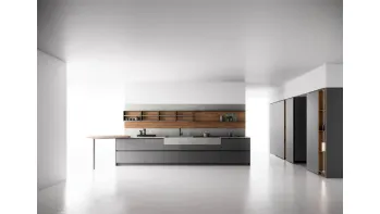 Cucina Moderna con penisola Anice 02 in laccato opaco Piombo e Noce classico con top in Laminam Pietra Piasentina di Valdesign