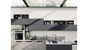 Cucina Moderna angolare in laminato effetto cemento con penisola Loft Wall di Arrex